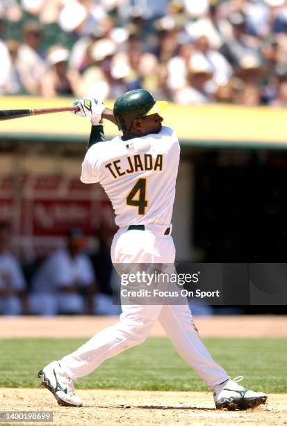 Miguel Tejada of the Oakland Athletics bats against the Minnesota Twins during a Major League Baseball game May 21, 2003 at the Oakland-Alameda...