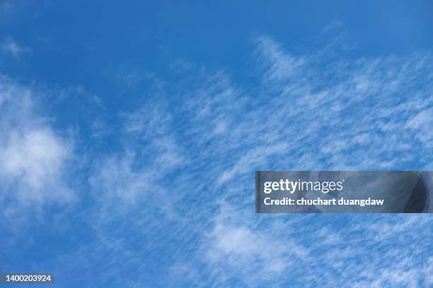 beautiful clear blue sky with scattered clouds - 巻積雲 ストックフォトと画像