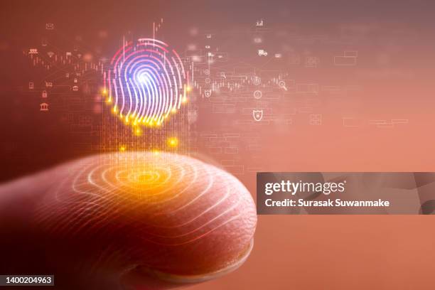 3d technology illustration a fingerprint scanner is integrated into the printed circuit. release binary code - digital identity stockfoto's en -beelden