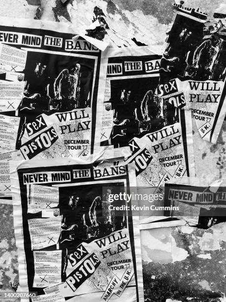 Posters advertising the Sex Pistols' 'Never Mind The Bans' tour of 1977, on a wall outside Ivanhoe's in Huddersfield, England on Christmas Day, 25th...