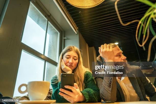 a loving couple man and woman - dinner date stock pictures, royalty-free photos & images