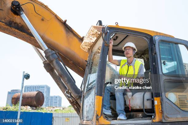 Dig Driver Digging To China Photos and Premium High Res Pictures - Getty Images