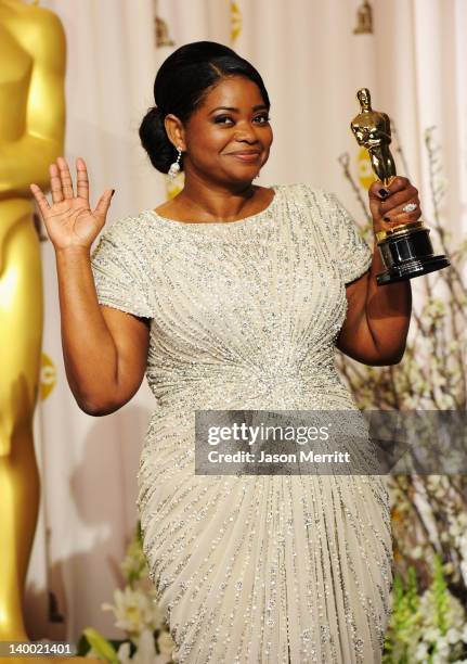 Actress Octavia Spencer, winner of the Best Supporting Actress Award for 'The Help,' poses in the press room at the 84th Annual Academy Awards held...