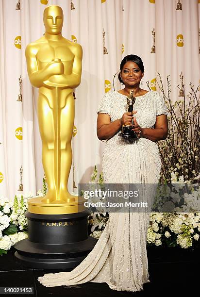 Actress Octavia Spencer, winner of the Best Supporting Actress Award for 'The Help,' poses in the press room at the 84th Annual Academy Awards held...