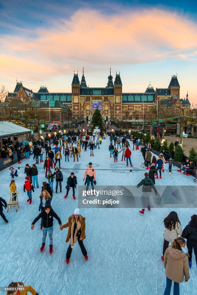Ice rink Rijksmuseum on a bright day during winter in Amsterdam. the netherlands