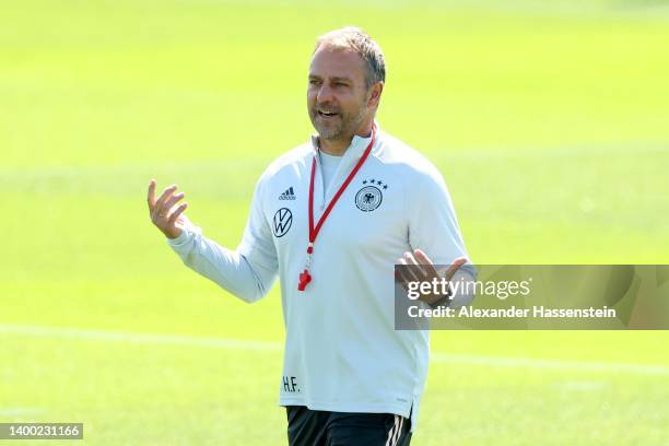 Hans-Dieter Flick, head coach of the German national team reacts to his players during a training session of the German national soccer team at...