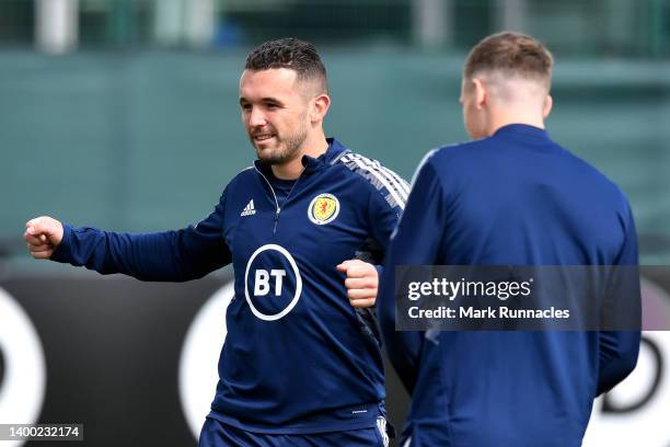 John McGinn of Scotland smiles during a Scotland Training Session at Oriam High Performance Centre on May 31, 2022 in Edinburgh, Scotland.