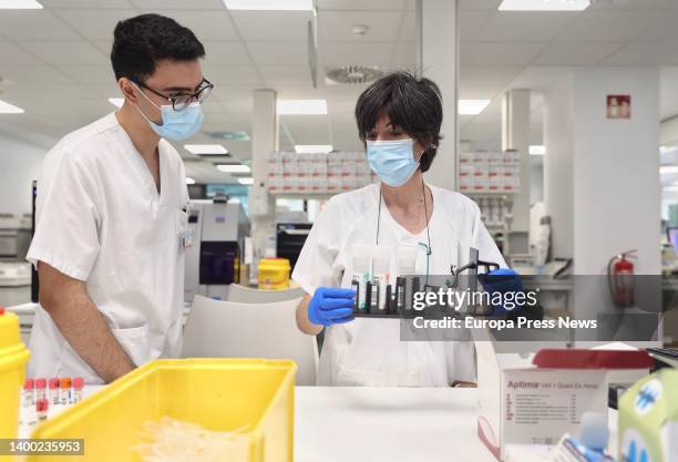 Several laboratory technicians work with PCR tests at the Microbiology Laboratory of the Gregorio Marañon Public Hospital, on 31 May, 2022 in Madrid,...