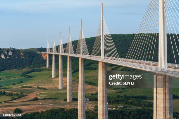 viaduc de millau, millau bridge at sunrise - millau viaduct stock pictures, royalty-free photos & images