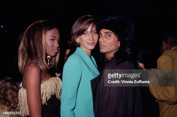 America fashion model Christy Turlington, British fashion model Naomi Campbell, and America photographer Steven Meisel attend the party to celebrate...