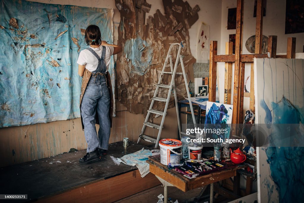 Artist working in studio