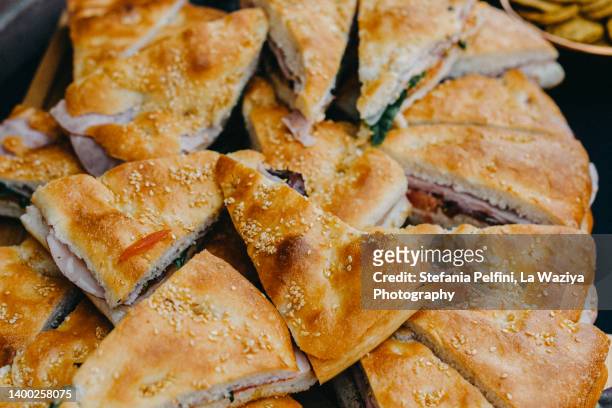 focaccia bread sandwiches - sandwich triangle stock pictures, royalty-free photos & images