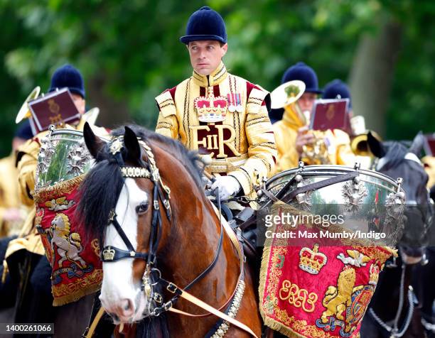 Drummer of The Mounted Band of The Household Cavalry rides on horseback down The Mall after taking part in Colonel's Review at Horse Guards Parade on...