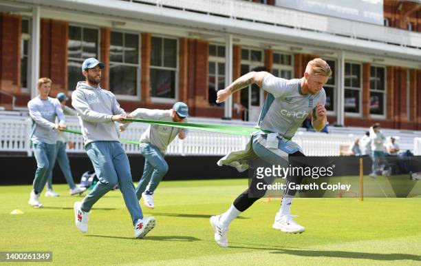 England captain Ben Stokes warms up with Ben Foakes during a nets session at Lord's Cricket Ground on May 31, 2022 in London, England.