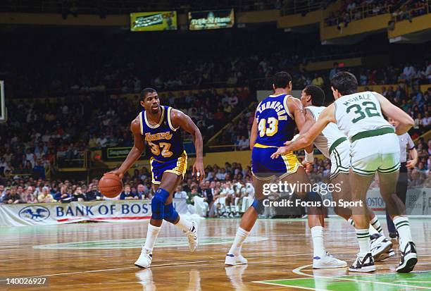 Earvin Magic Johnson of the Los Angeles Lakers dribbles the ball against the Boston Celtics during the 1987 NBA Basketball Finals at the Boston...