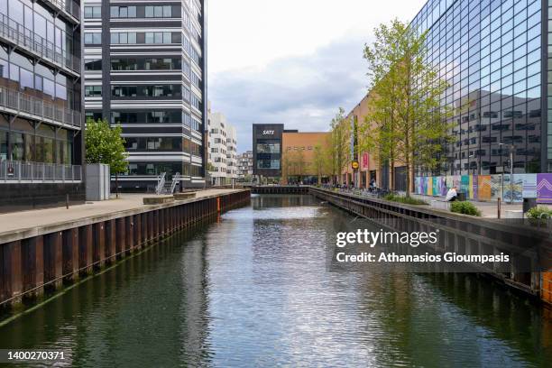 Kalvebod Brygge or Kalvebod Onda on May 29, 2022 in Copenhagen, Denmark. Kalvebod Brygge is a waterfront area in the Vesterbro district of...