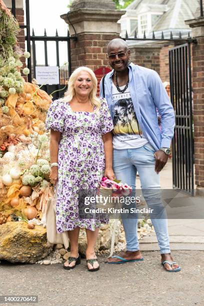 Vanessa Feltz wears a Vila dress, vintage bag and sparkly flip-flops with Ben Ofoedu arrive to Chelsea Flower Show 2022 on May 23, 2022 in London,...