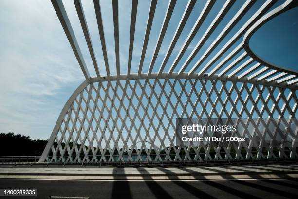 empty bridge against sky,china - arch bridge stock pictures, royalty-free photos & images