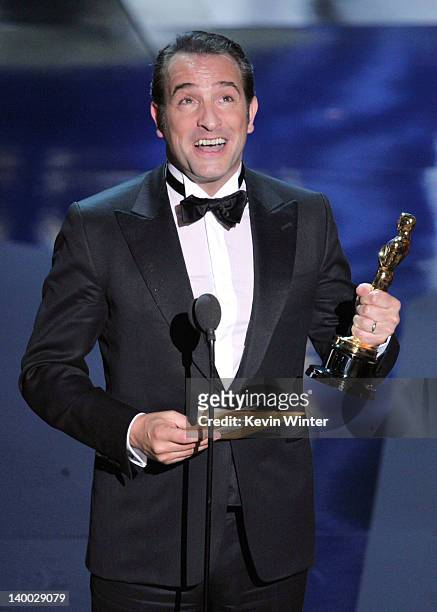 Actor Jean Dujardin accepts the Best Actor Award for 'The Artist' onstage during the 84th Annual Academy Awards held at the Hollywood & Highland...