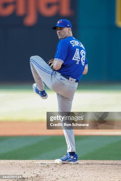 Ross Stripling of the Toronto Blue Jays pitches against the Cleveland Guardians during the first inning of game two of a doubleheader at Progressive...