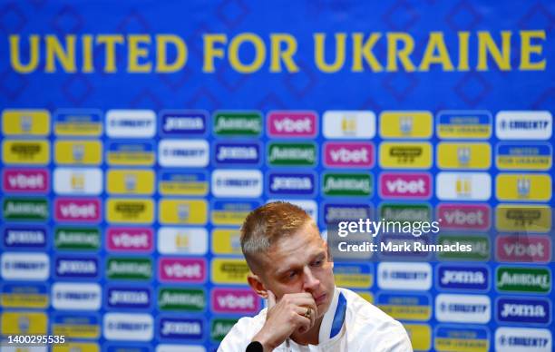 Oleksandr Zinchenko of Ukraine speaks to the media during the Ukraine Press Conference at Hampden Park on May 31, 2022 in Glasgow, Scotland.