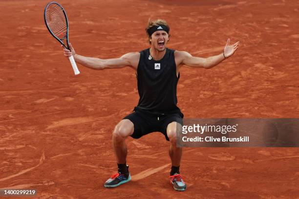 Alexander Zverev of Germany celebrates match point against Carlos Alcaraz of Spain during the Men's Singles Quarter Final match on Day 10 of The 2022...