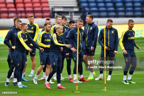 Ukraine players warm up during the Ukraine Training Session at Hampden Park on May 31, 2022 in Glasgow, Scotland.