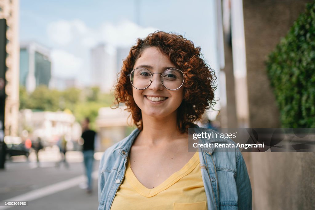 Portrait of university student at Paulista Avenue in Sao Paulo , Brazil