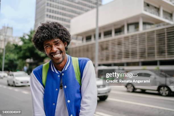 portrait of black university student at paulista avenue in sao paulo , brazil - avenida paulista stock pictures, royalty-free photos & images