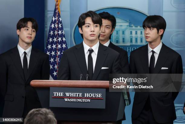Jimin, Jungkook, RM and Jin of the South Korean pop group BTS speak at the daily press briefing at the White House on May 31, 2022 in Washington, DC....