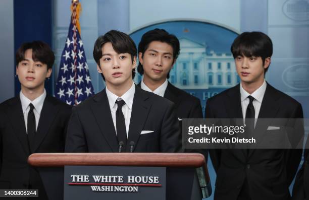 Jimin, Jungkook, RM and Jin of the South Korean pop group BTS speak at the daily press briefing at the White House on May 31, 2022 in Washington, DC....