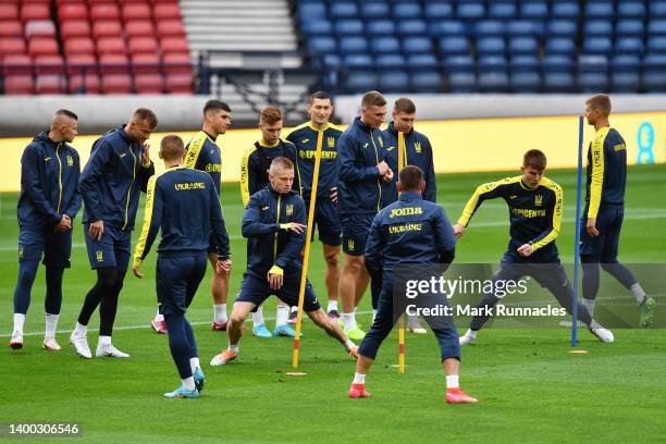 Oleksandr Zinchenko of Ukraine warms up during the Ukraine Training Session at Hampden Park on May 31, 2022 in Glasgow, Scotland.