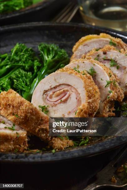 crispy baked chicken cordon bleu - cordon bleu stock pictures, royalty-free photos & images