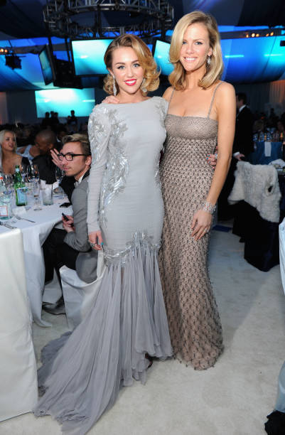 Singer Miley Cyrus and Model Brooklyn Decker attend the 20th Annual Elton John AIDS Foundation Academy Awards Viewing Party at The City of West...
