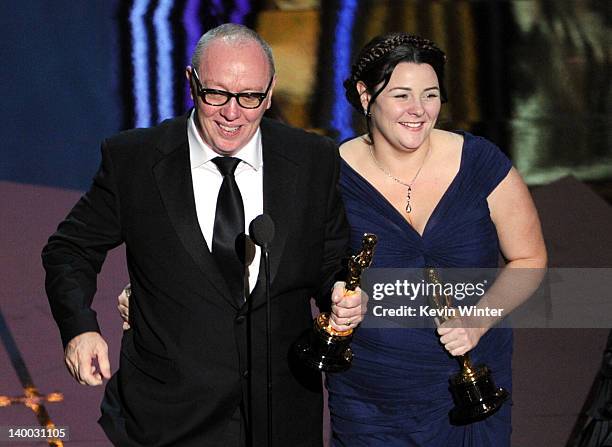 Filmmakers Terry George and Oorlagh George accept the Best Live Action Short Film Award for 'The Shore' onstage during the 84th Annual Academy Awards...