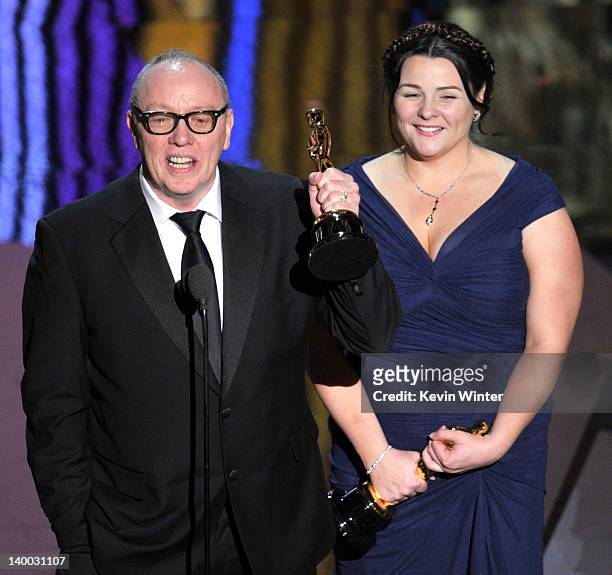 Filmmakers Terry George and Oorlagh George accept the Best Live Action Short Film Award for 'The Shore' onstage during the 84th Annual Academy Awards...