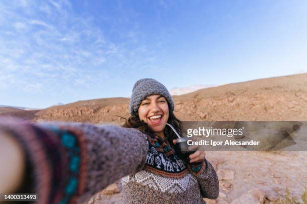 drinking yerba mate and taking a selfie - antofagasta region stock pictures, royalty-free photos & images