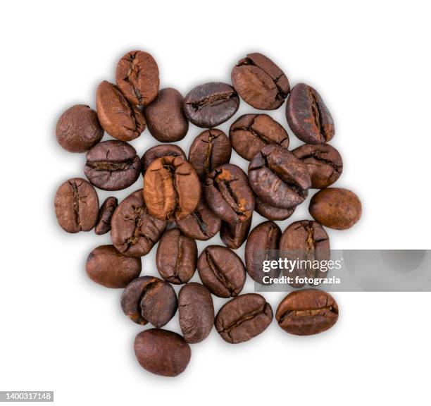 roasted scented coffee beans isolated on white background - caffeine fotografías e imágenes de stock