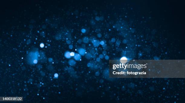 blue defocused lights background - luminosity stock pictures, royalty-free photos & images