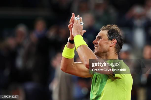 Rafael Nadal of Spain applauds fans after victory against Novak Djokovic of Serbia during the Men's Singles Quarter Final match on Day 10 of The 2022...