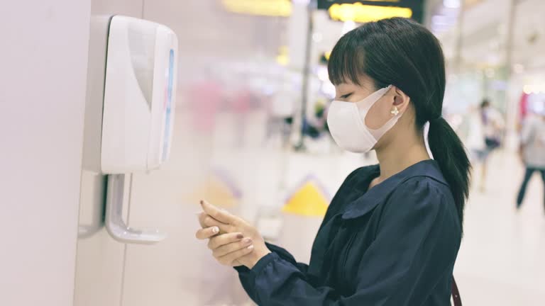 Auton Hand Using Hand Sanitizer In Public Videos and HD Footage - Getty Images