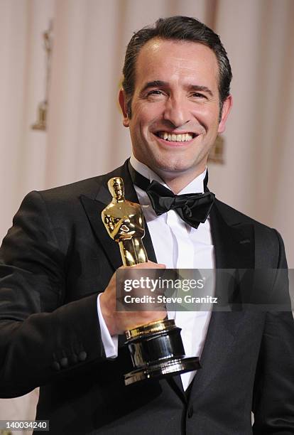 Actor Jean Dujardin poses in the press room at the 84th Annual Academy Awards held at the Hollywood & Highland Center on February 26, 2012 in...