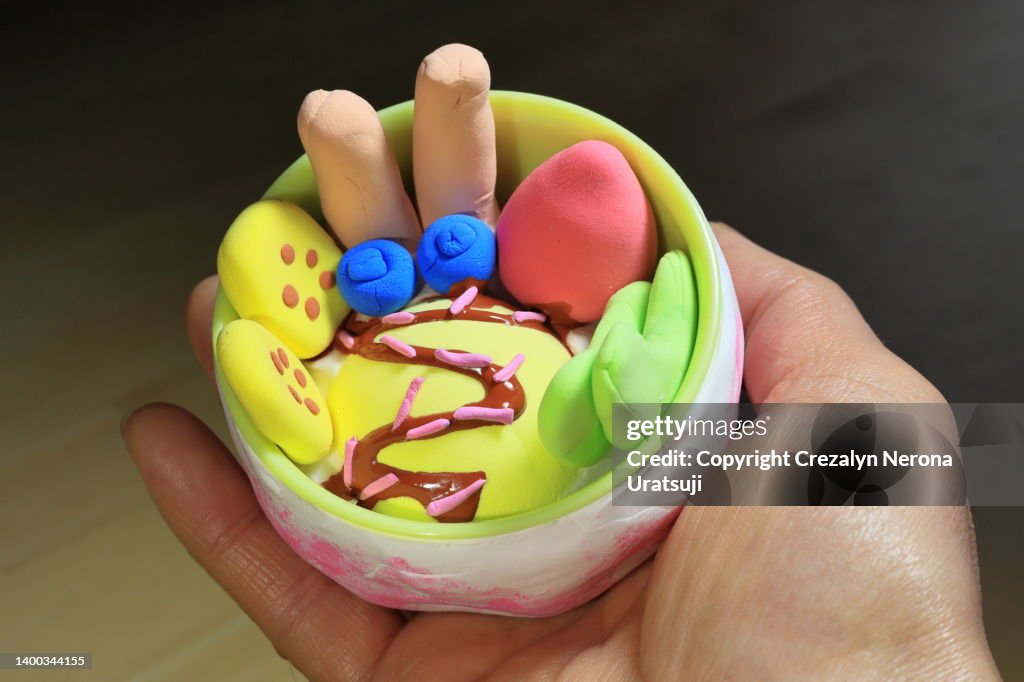 Handmade Clay Fruits on Girl's Hand