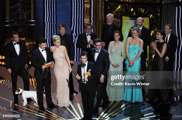 Producer Thomas Langmann accepts the Best Picture Award for 'The Artist' as he is onstage with members of the cast and crew during the 84th Annual...