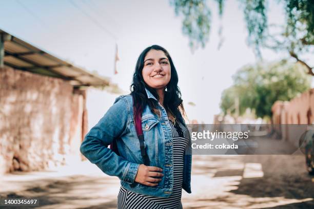 young chilean woman on the streets of atacama - chilean ethnicity stock pictures, royalty-free photos & images