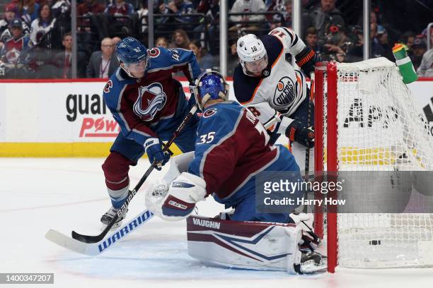 Zach Hyman of the Edmonton Oilers scores a goal on Darcy Kuemper of the Colorado Avalanche during the first period in Game One of the Western...