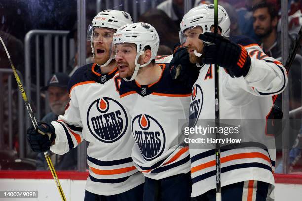 Zach Hyman of the Edmonton Oilers celebrates with his teammates after scoring a goal on Darcy Kuemper of the Colorado Avalanche during the first...