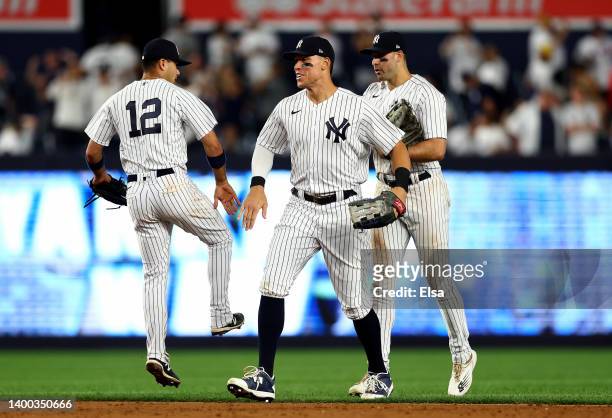 Isiah Kiner-Falefa, Aaron Judge and Joey Gallo of the New York Yankees celebrate the win over the Los Angeles Angels at Yankee Stadium on May 31,...