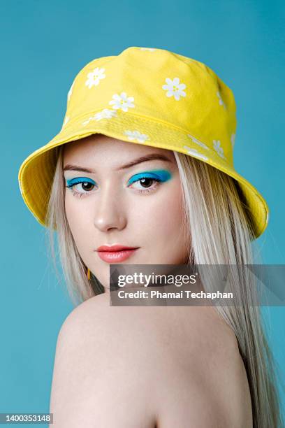 happy woman - yellow eyeshadow stock pictures, royalty-free photos & images