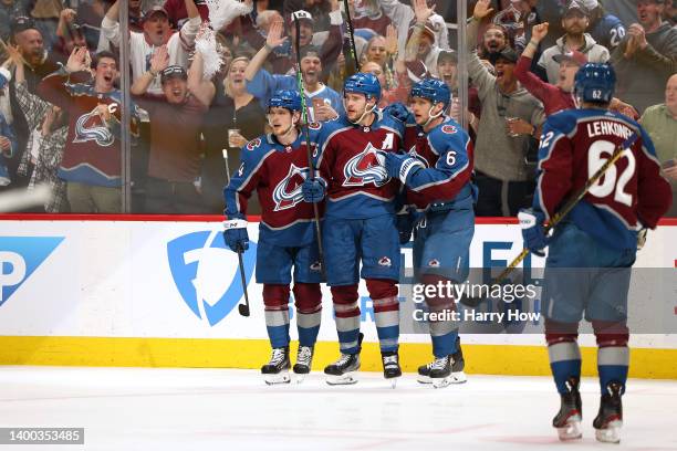 Mikko Rantanen of the Colorado Avalanche celebrates with his teammates Bowen Byram, Erik Johnson and Artturi Lehkonen after scoring a goal against...